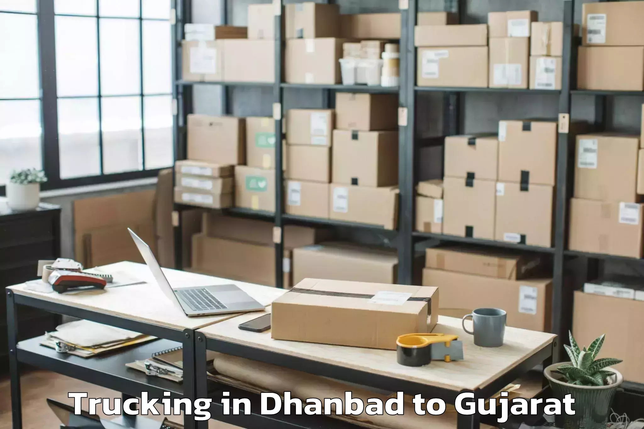 Dhanbad to Gondal Trucking Booking